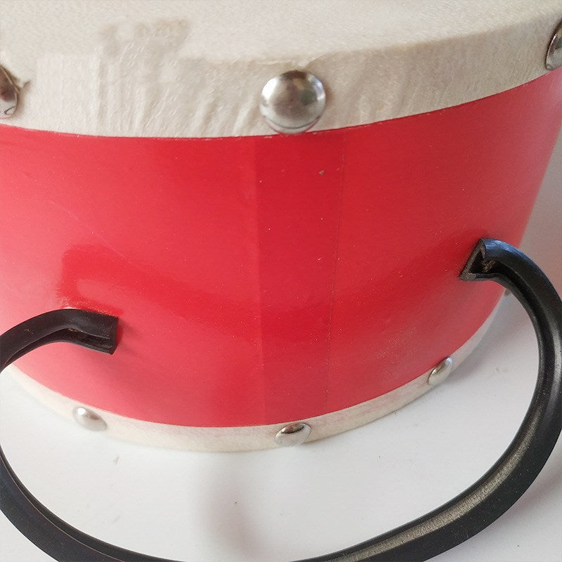 Sheepskin Snare Drum With Children's Hands Playing Drums