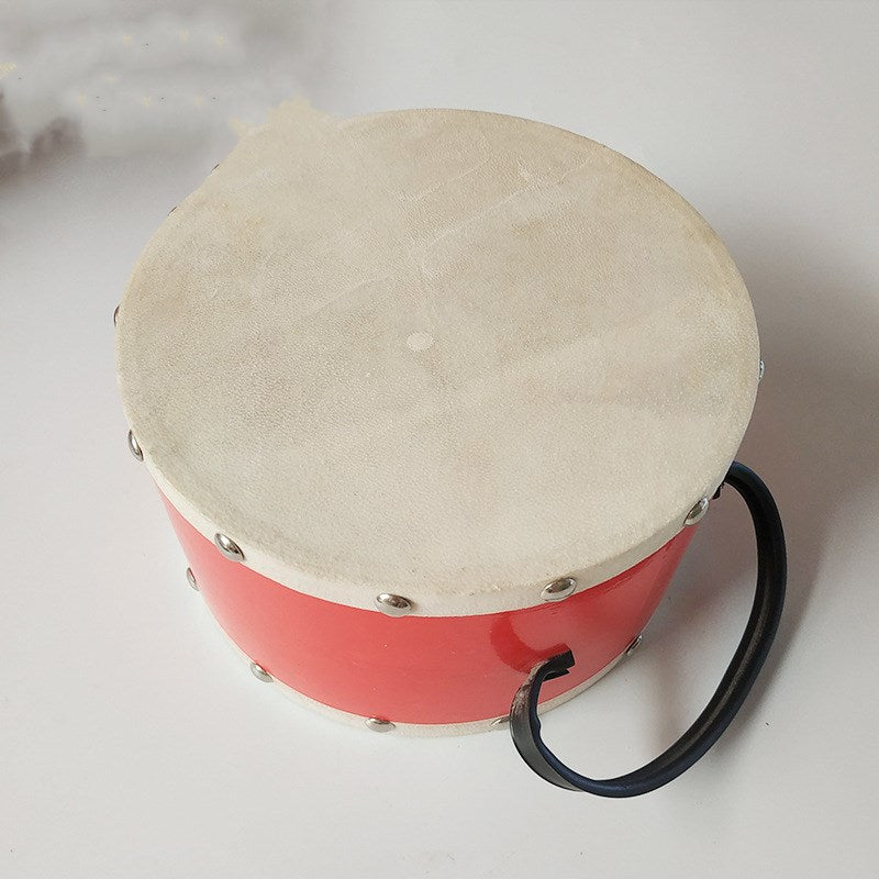 Sheepskin Snare Drum With Children's Hands Playing Drums