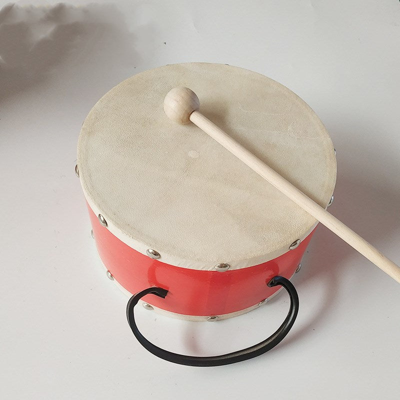 Sheepskin Snare Drum With Children's Hands Playing Drums